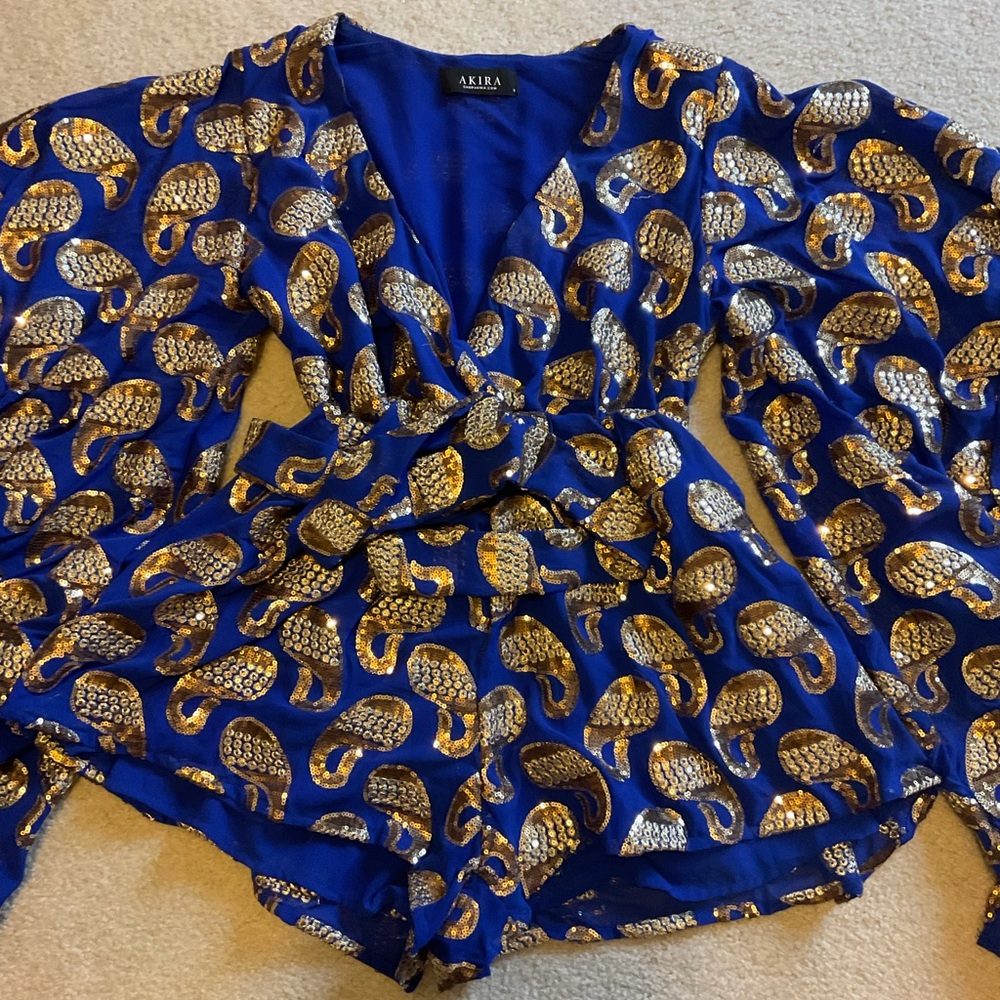 Akira romper. In perfect condition